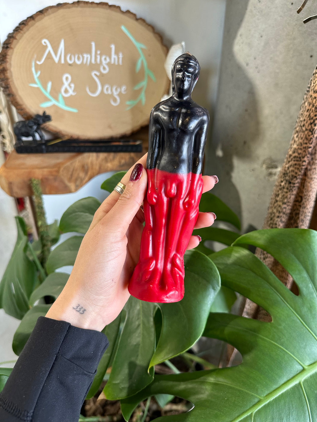 Red and Black Male Body Candle
