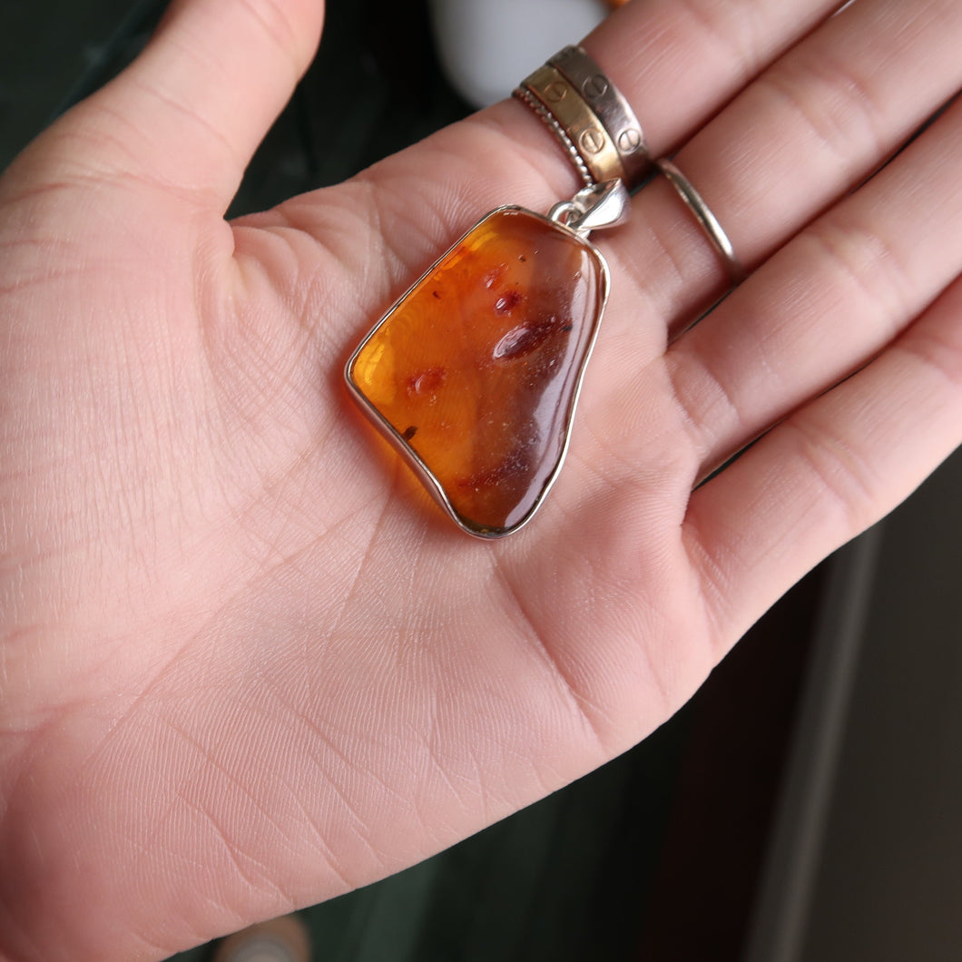 Baltic Amber Silver & Platinum Pendant From Madagascar