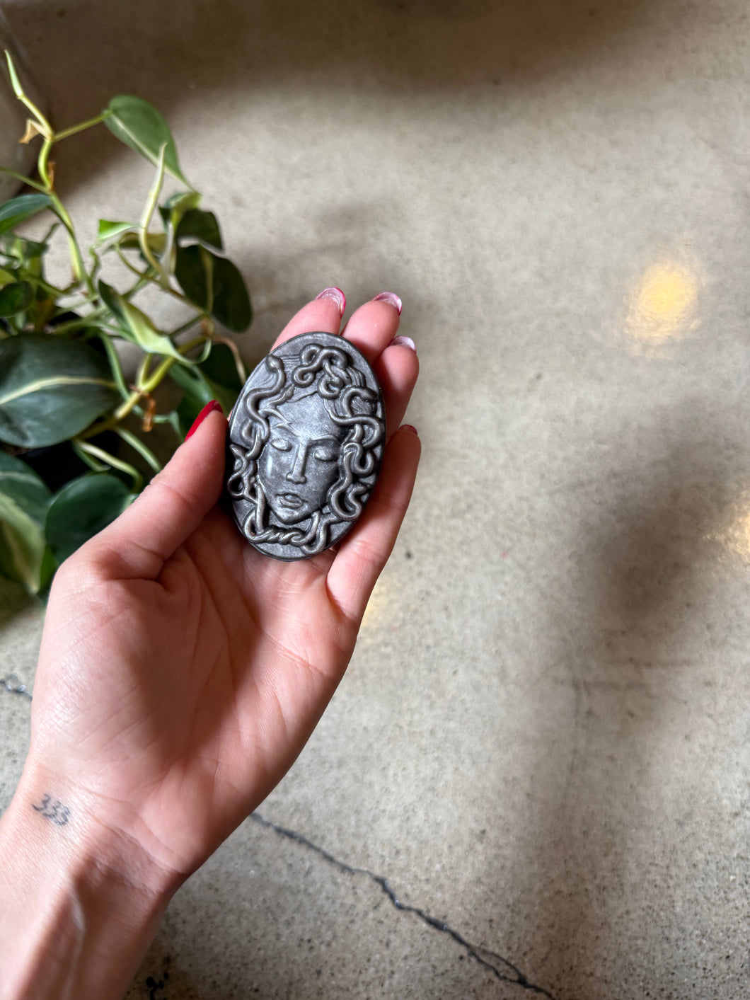 Silver Sheen Medusa Crystal Carving